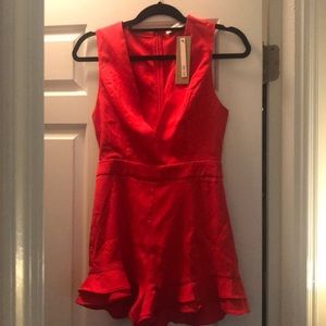 Red lipstick ruffle romper (from VIci)